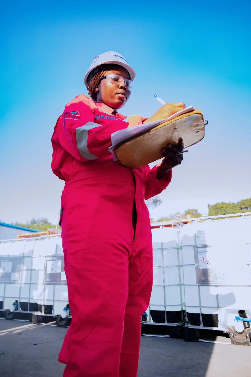 Field QA in safety coveralls